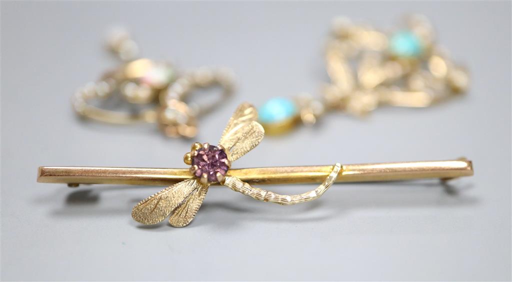 Two Edwardian 9ct and gem set pendants and a 9ct and gem set dragonfly bar brooch, gross 5.6 grams.